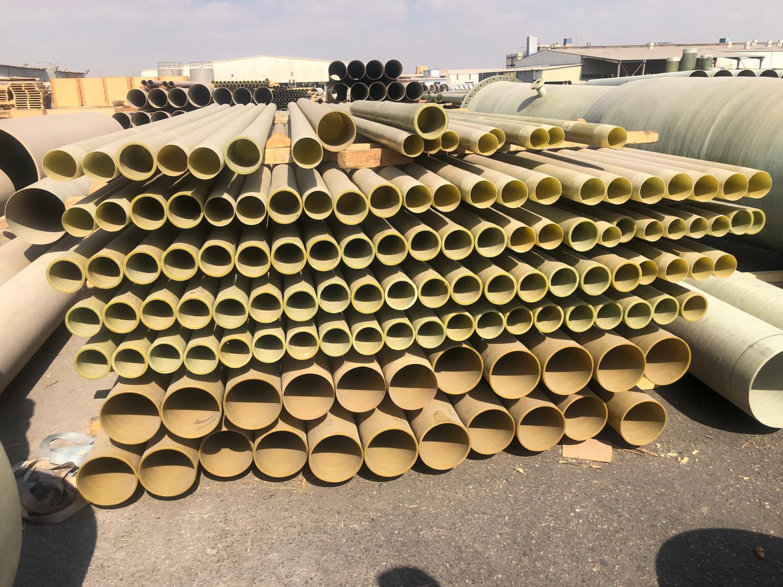 GRP pipes stacked in yard